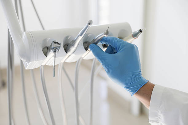 Professional Dental Implants technician working in Mastic, NY